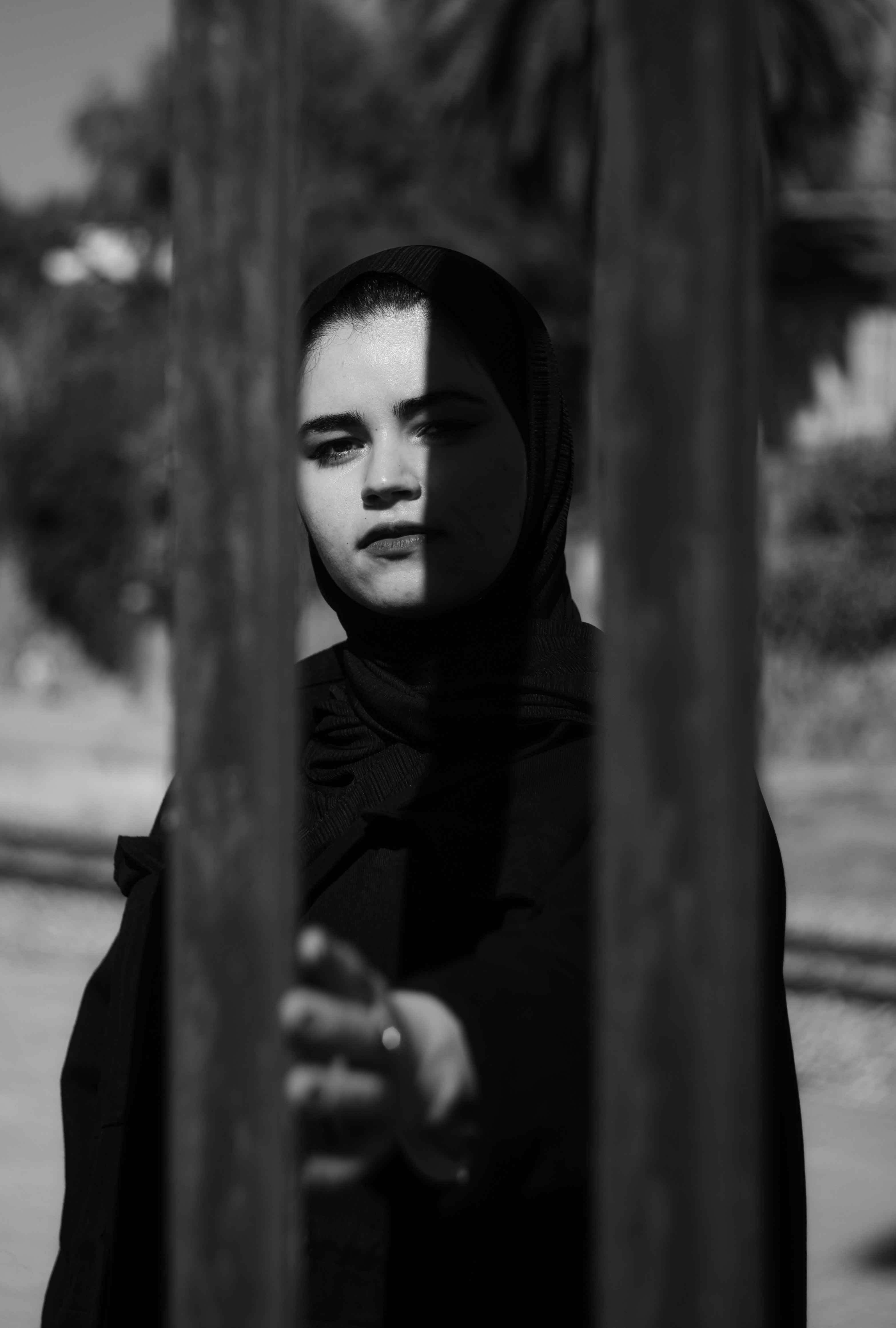 grayscale photo of woman in hijab